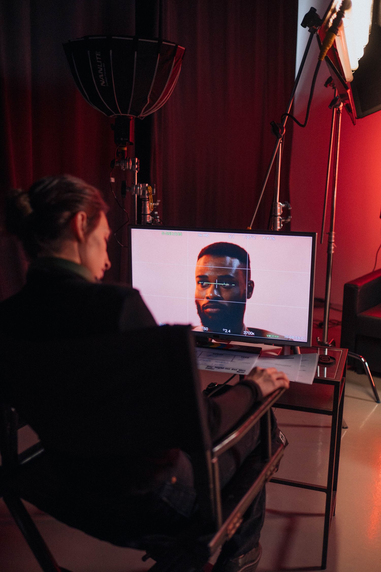 Production team reviewing an image on a monitor